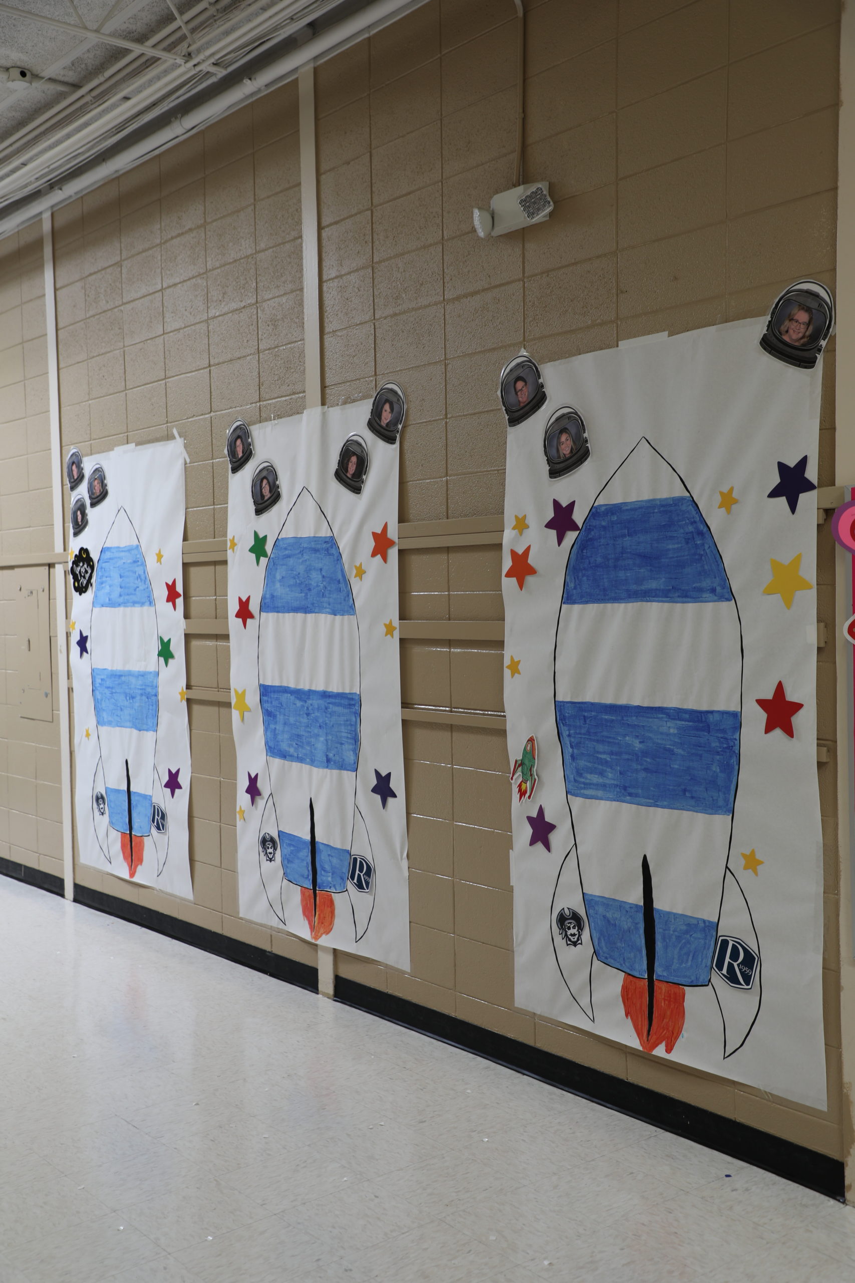 Giant rocket ship posters line the halls leading up to the entrance of the Lower School Library. As students read books each week, they’ll be added to the rockets to see which grade can blast off first!