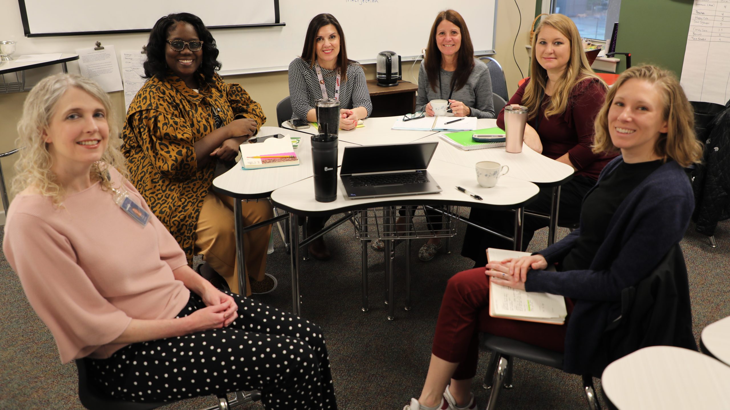 A group of faculty and staff meet to discuss the Read Across Randolph activities. 
(Pictured l to r): Middle School Librarian Kelly Kessler, 7th Grade Language Arts Teacher Delicia Potter, Lower School Librarian Cathy Zeller, Middle School English Department Chair Shelly Harriman, 6th Grade Language Arts Teacher Nikki Cornelison and 5th Grade Language Arts Teacher Elise Hinken.